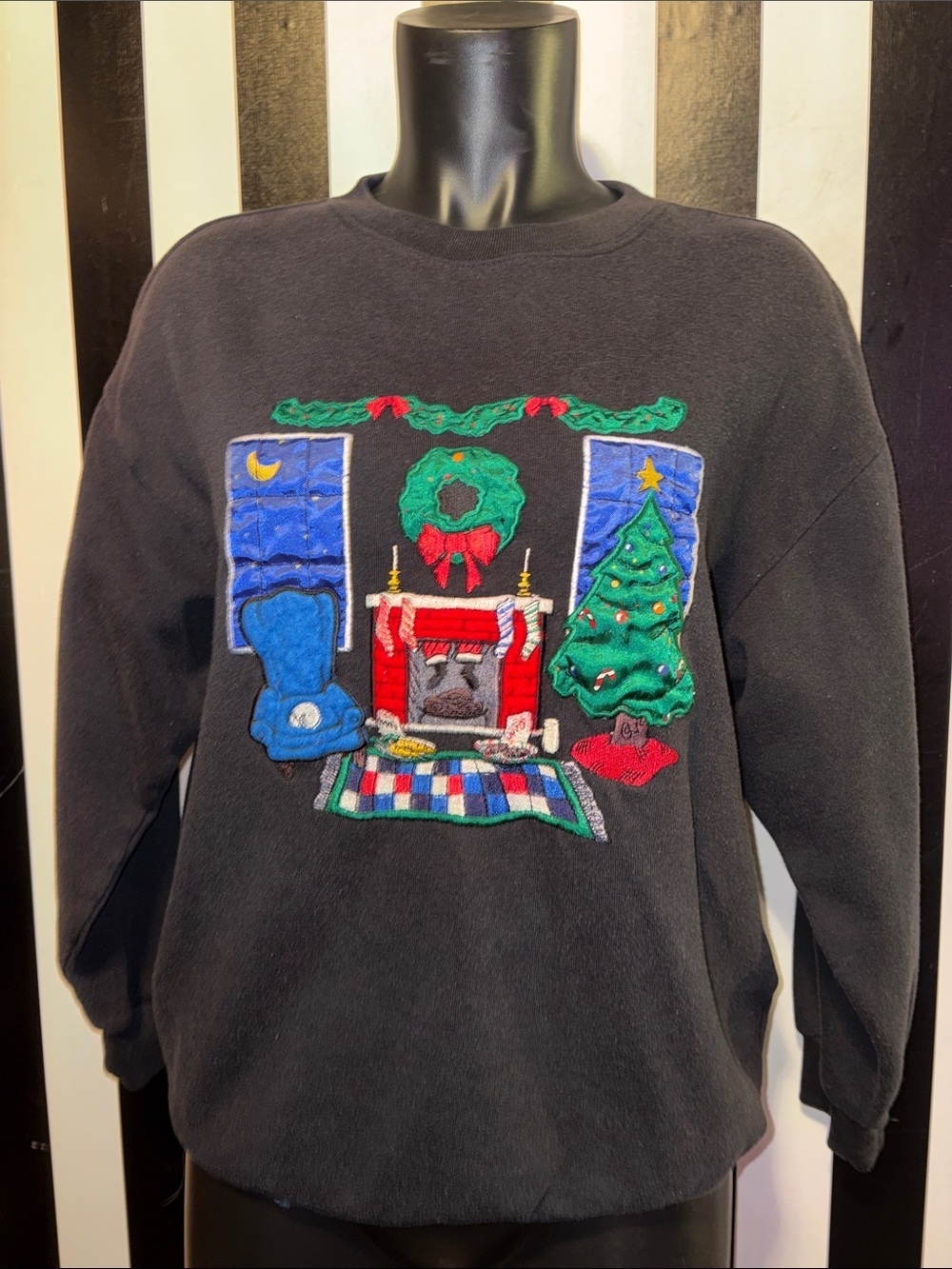 Woman’s Black Holiday Crewneck Sweater with Festive Fireplace Motif Embroidered